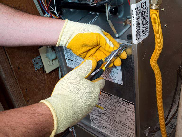 Hispanic air conditioning technician
